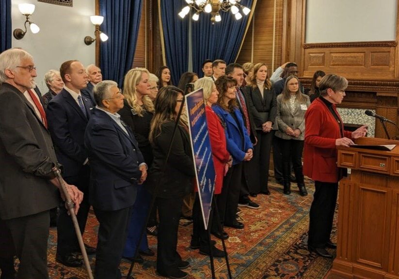 Gov. Laura Kelly and a bipartisan group of legislators propose a property, sales and income tax reduction bill on the first day of the 2024 session.