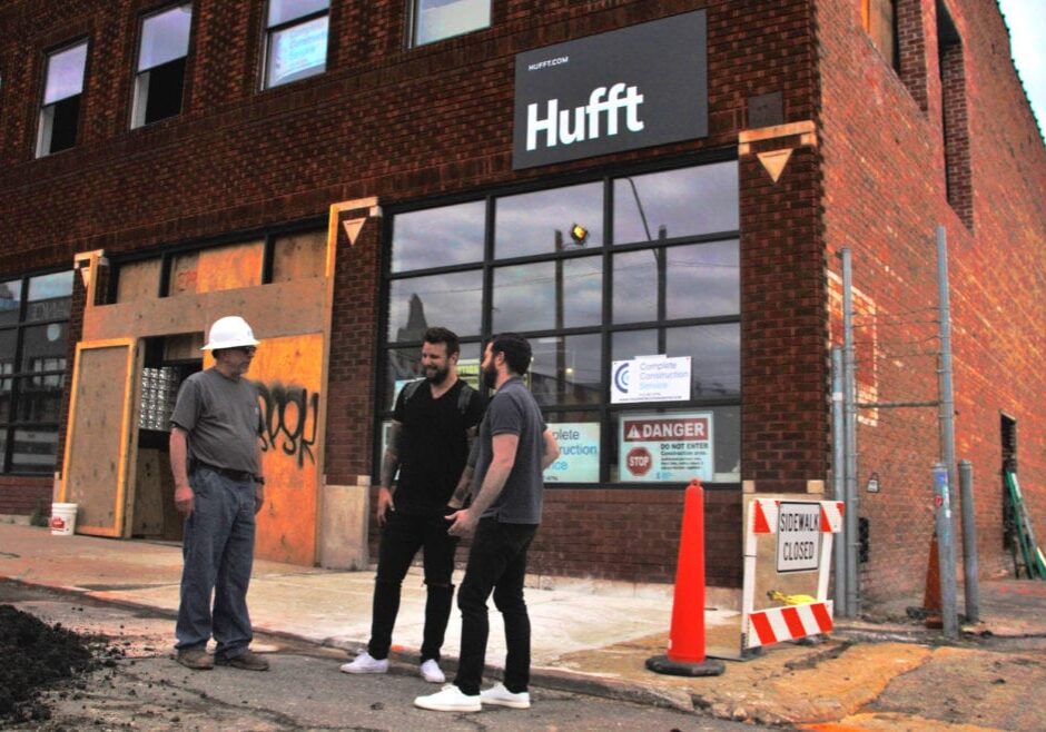 Co-owner Davis Engle (middle) and General Manager Dominic Hoferer (right) talk about the construction progress of Parlor KC.