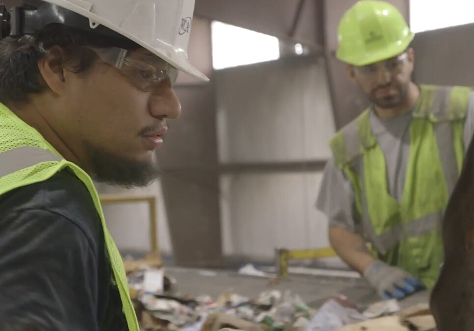 Workers at recycling facility
