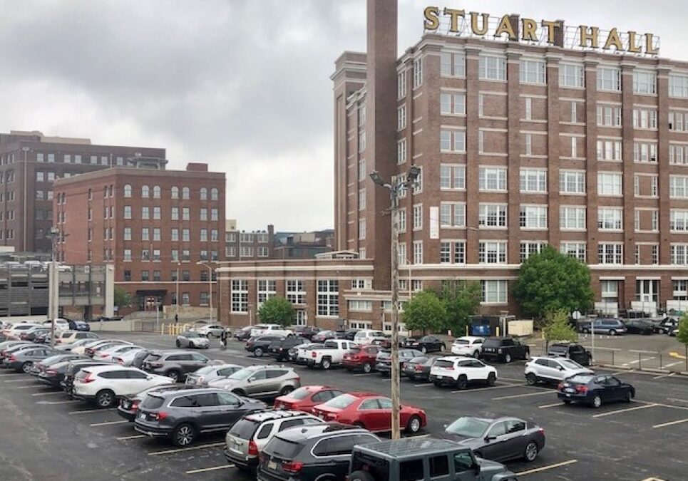The Tracks apartment project will be built on this parking lot next to the historic Freight House building.