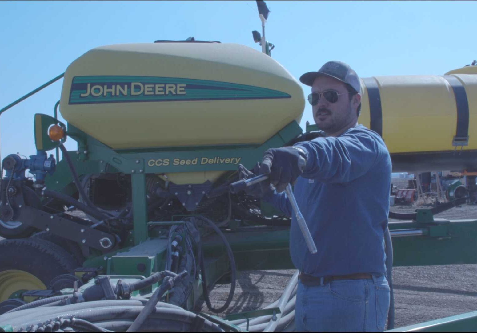 Trey Garst works on his planter in preparation for a welder to come on March 5, 2021.