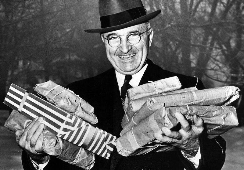 President Harry Truman bearing Christmas gifts