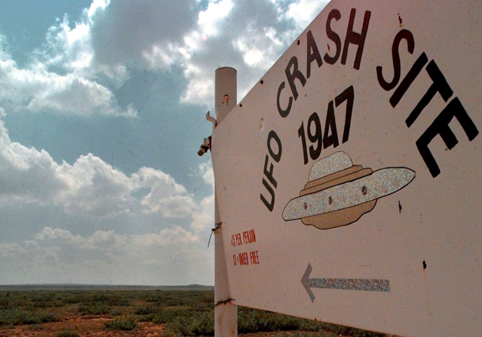 Tour sign for an alleged UFO crash site near Rosewell, New Mexico.
