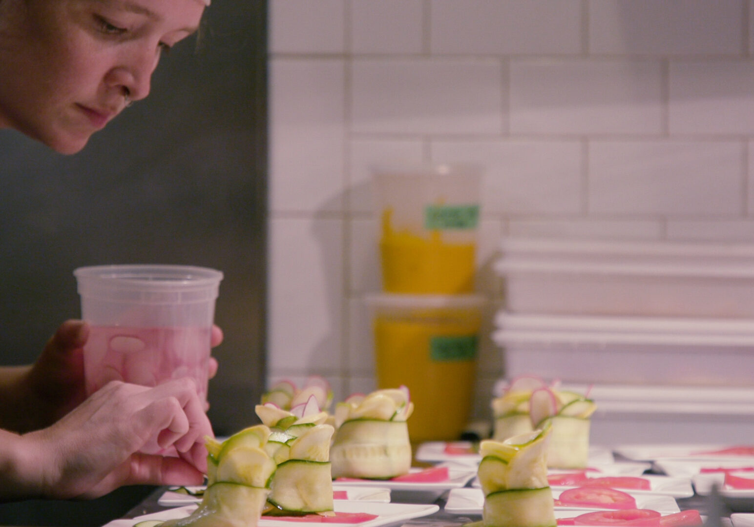 Chef Sara Osborn prepares a meal.