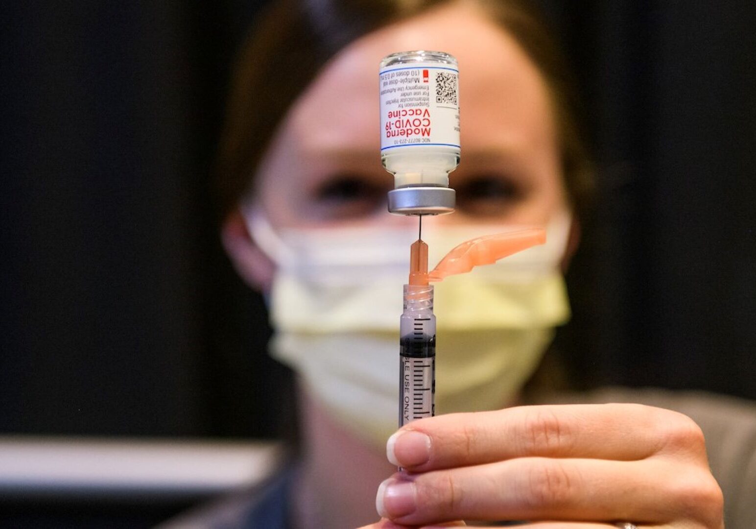 Syringes of COVID-19 vaccinations are filled during MU Health Care’s mass vaccination clinic at the Walsworth Family Columns Club at Faurot Field in Columbia on Feb. 4, 2021.