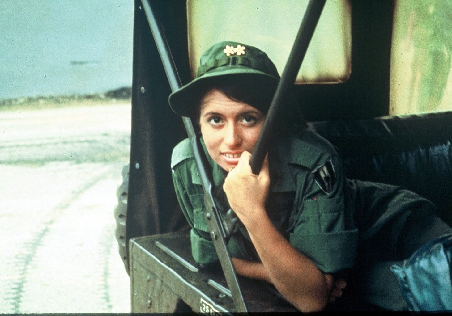 Louise Graul, a recent nursing school graduate, arrived in South Vietnam in 1969. In 2015 this photo appeared on the cover of her book -- writing as Lou Eisenbrandt -- “Vietnam Nurse: Mending & Remembering.”