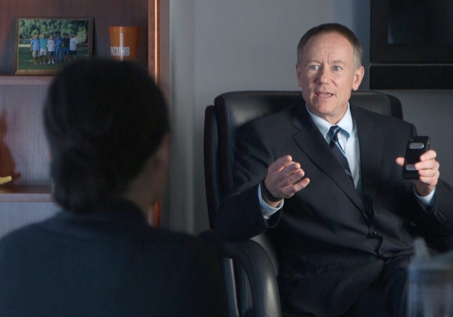 Wayne Carter, CEO of KCALSI, speaks with reporter Caitlin Cress. (Photo by Todd Feeback/The Hale Center for Journalism)