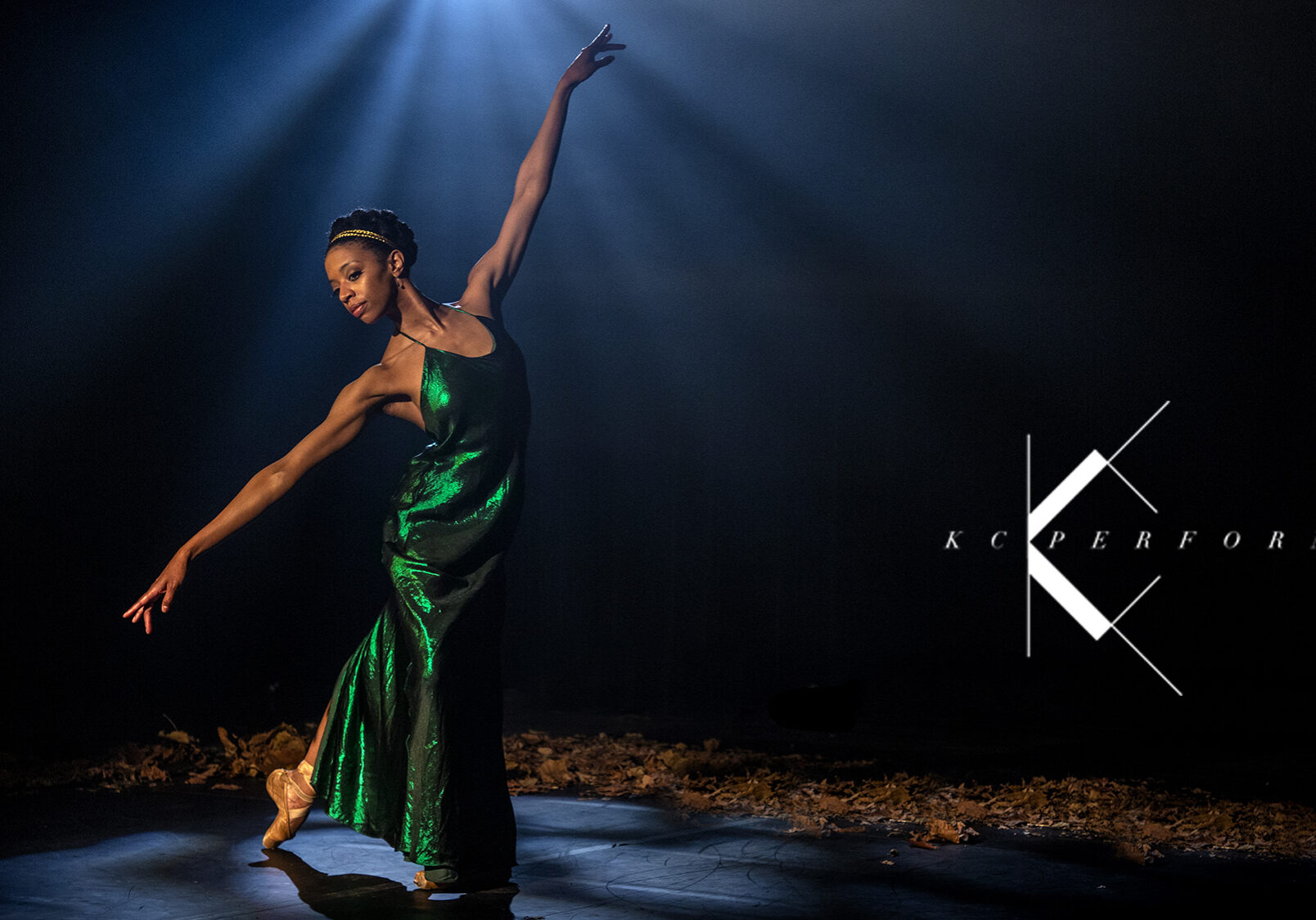 Dacer Whitney Huell poses, arms outstretched diagonally, for her performance of "What Angel Wakes Me" from a Midsummer Night’s Dream, Act III, Scene I.