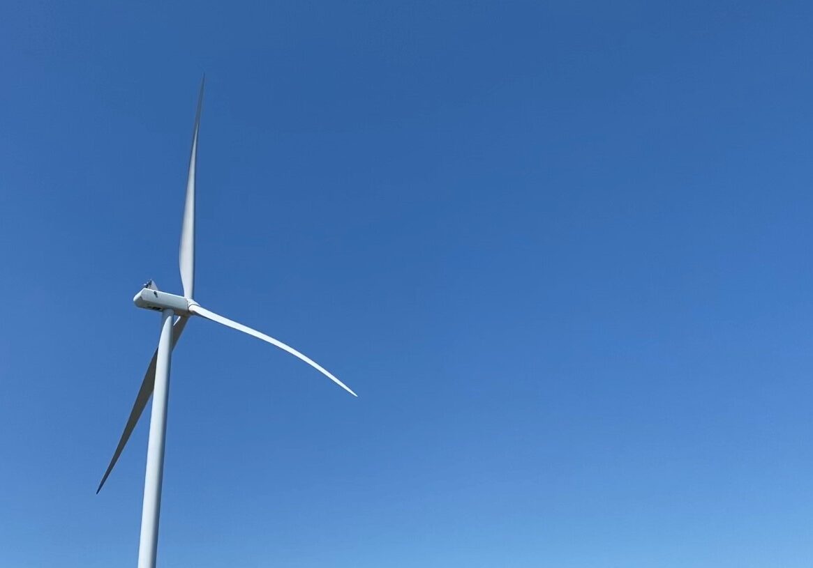 A wind turbine towers above Queen City, Missouri.