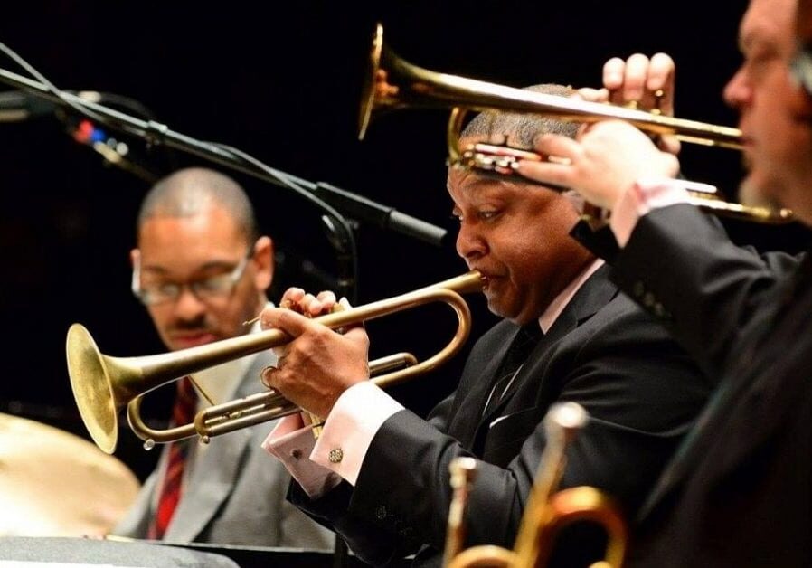 Jazz musicians playing instruments.