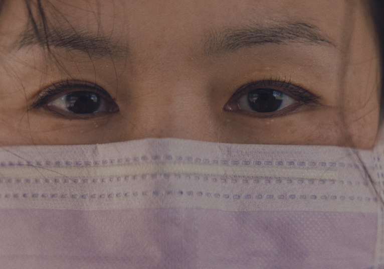 Yuka Naito-Billen in a surgical mask