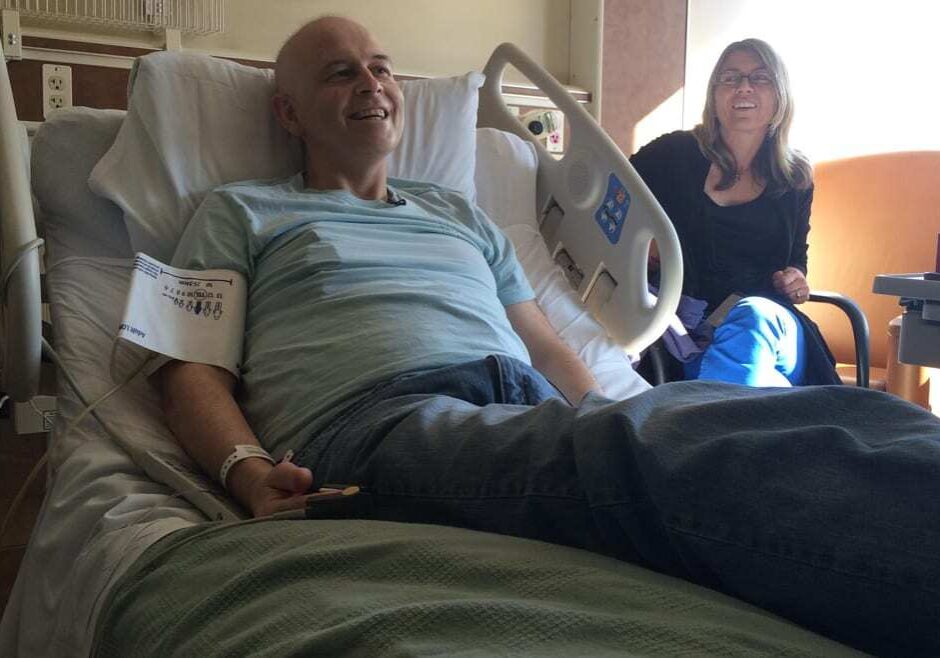 Carl Adams and his wife Stacey prepare for the reinfusion of his engineered T cells Tuesday at the University of Kansas Hospital in Kansas City, Kansas. (Photo: Alex Smith | Heartland Health Monitor)