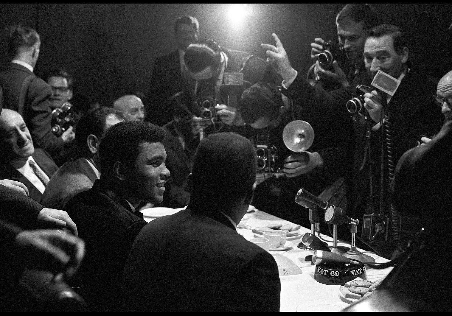 Muhammad Ali interviewed by reporters in London, England,
