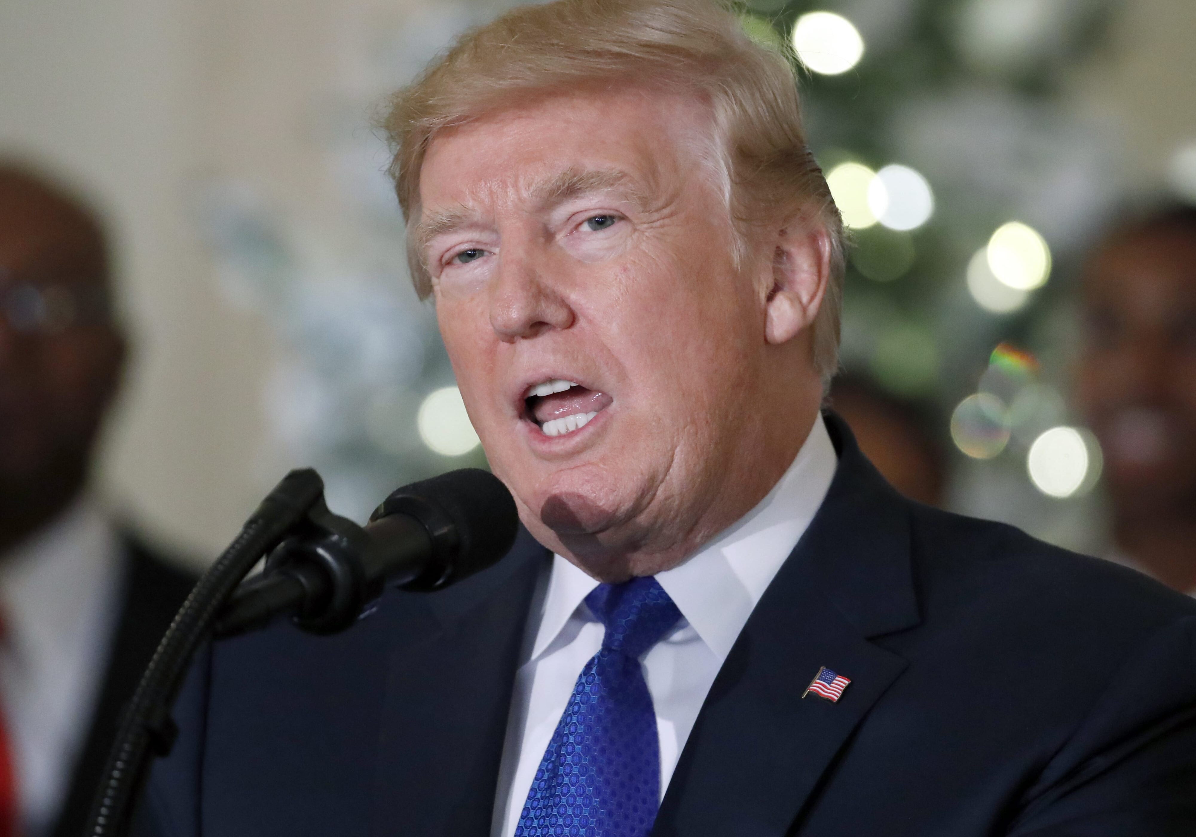 President Trump speaks about tax overhaul in the Grand Foyer of the White House on Wednesday. Republican lawmakers say they've reached a deal on their tax bill, but they haven't released details yet.