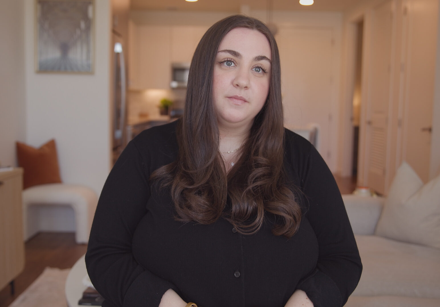 Woman in a black shirt.