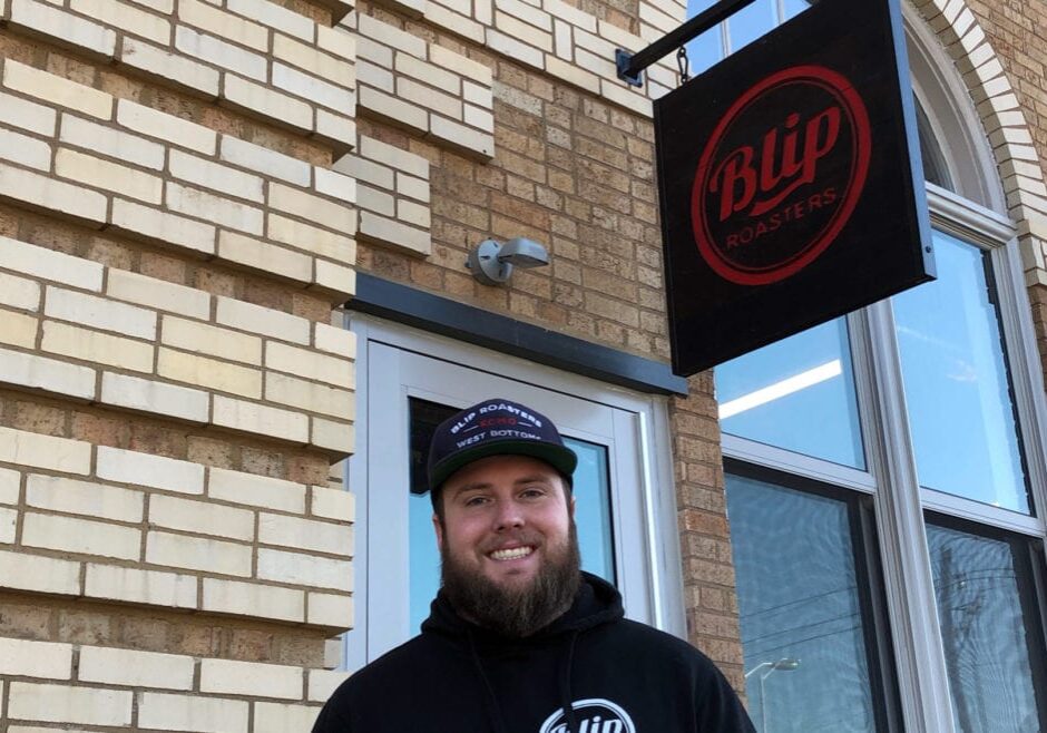 Ian Davis in front of the newly opened Blip Roasters Troost Avenue.