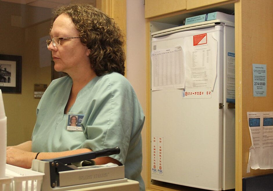 Photo by Susie Fagan

Jodi Buckmeier, a licensed practical nurse, checks medication information for residents at Brewster Place in Topeka. Brewster Place ranks among Kansas nursing homes with the lowest rates of use of antipsychotic medication for its residents - at 7.8 percent for the last quarter of 2013 or the first quarter of 2014 - although the state's overall rate ranks 47th worst.