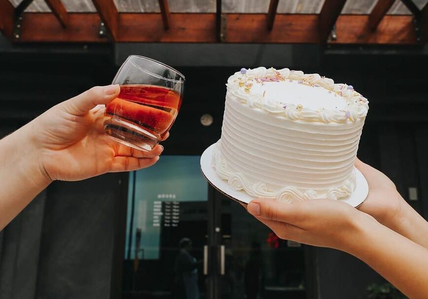 Have your cake and wine too with McLain's Market Lawrence.