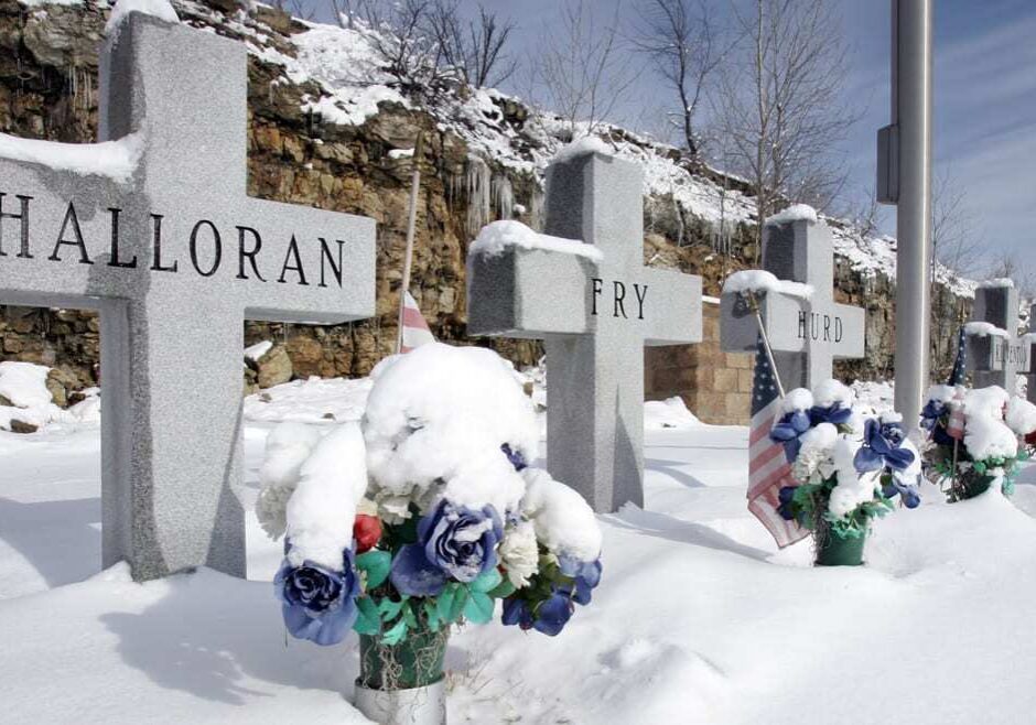 Graves of firefighters covered in snow