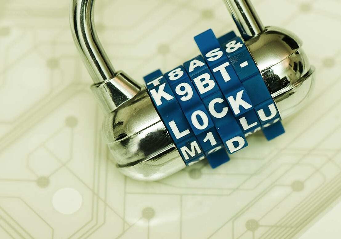 Photo of padlock on top of circuit board