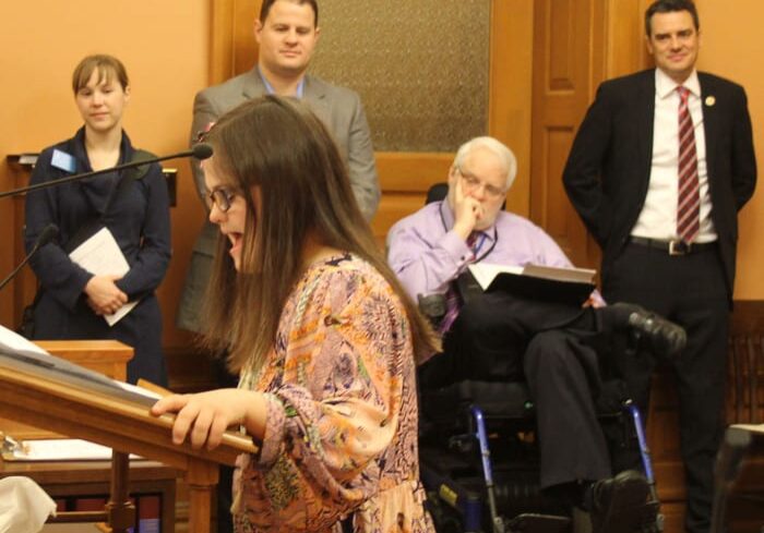Olathe resident Rachel Mast, 15, spoke Thursday to a House committee. She and Rep. Kevin Yoder, at far right, spoke in favor of a bill to allow tax-exempt savings accounts for Kansas children with disabilities.
Photo: Andy Marso / Heartland Health Monitor