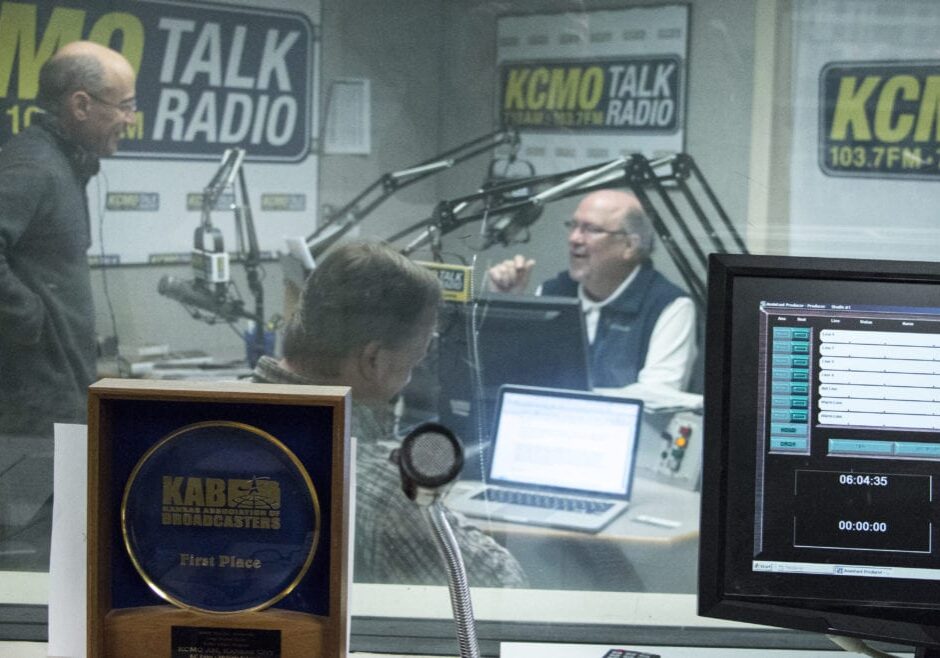 Zedek talks with Hill before a show