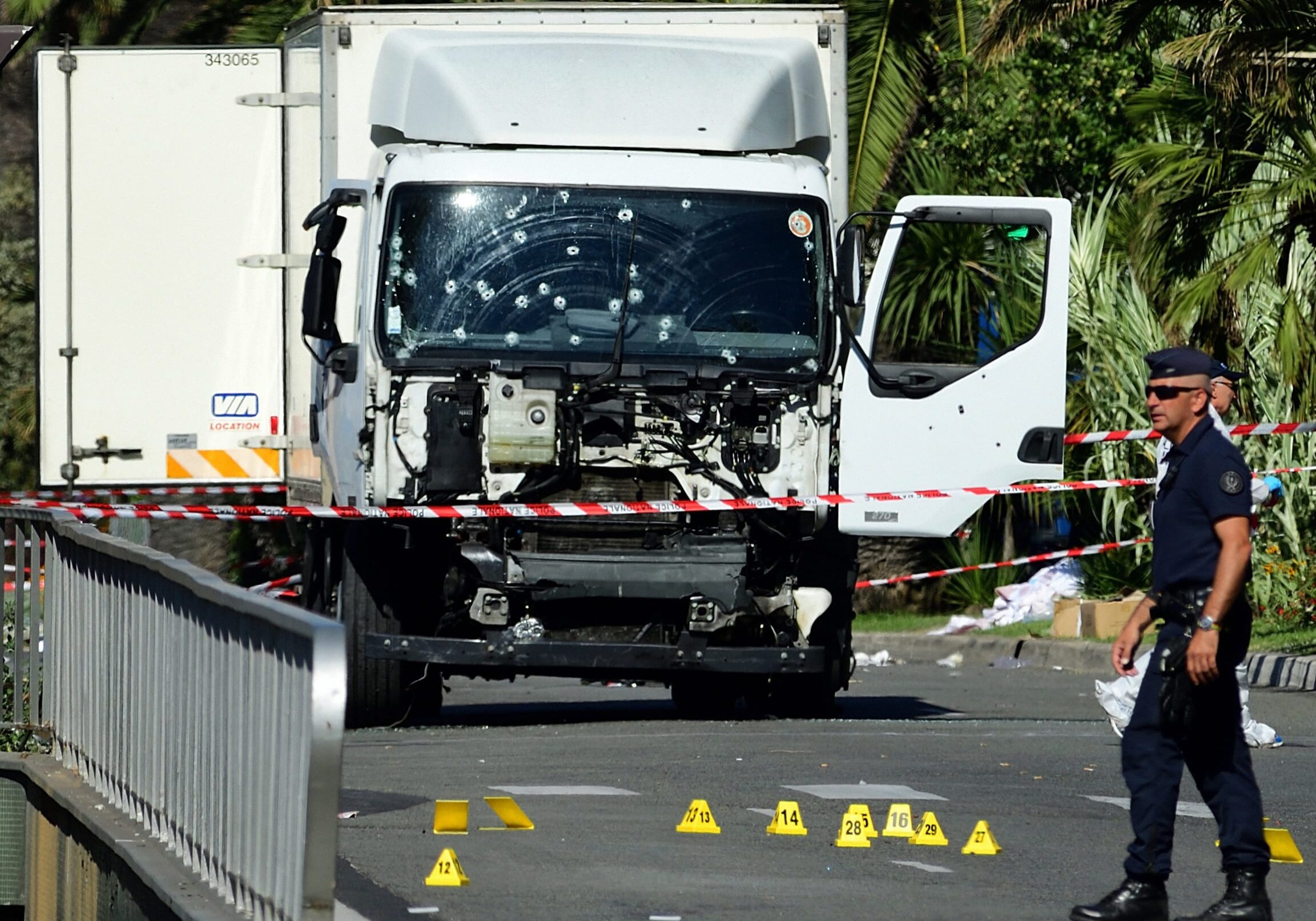 A truck with bullet holes.
