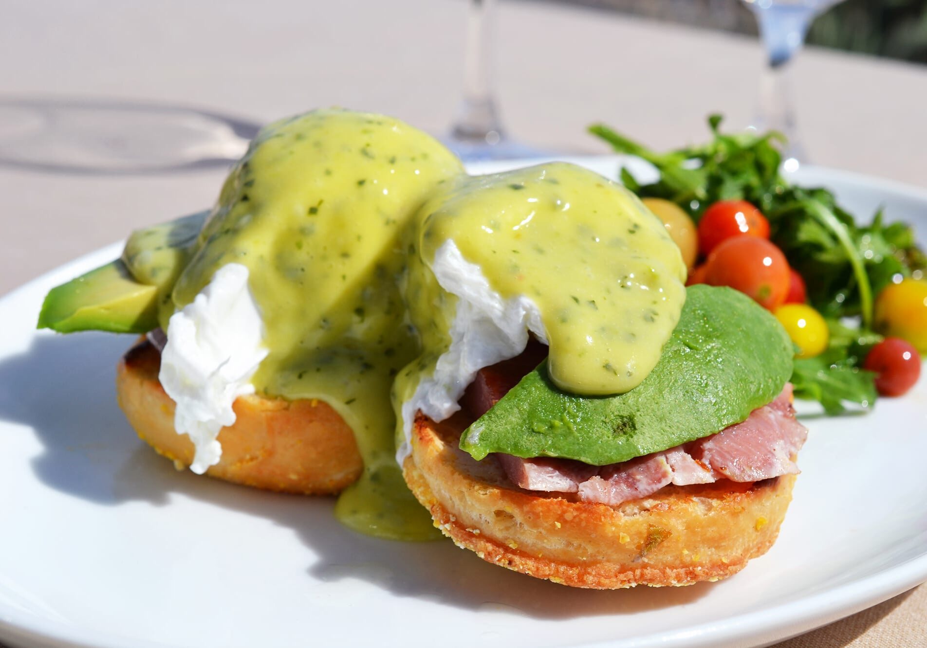 Green eggs and ham is a dish at once familiar to many and yet mysterious — no one can say for sure what this meal would translate to as real, edible food. Mar'sel, a Los Angeles county restaurant inside the ocean-side resort Terranea, crafted a green eggs and ham Benedict with prosciutto and Californian touches like salsa verde hollandaise and avocad
