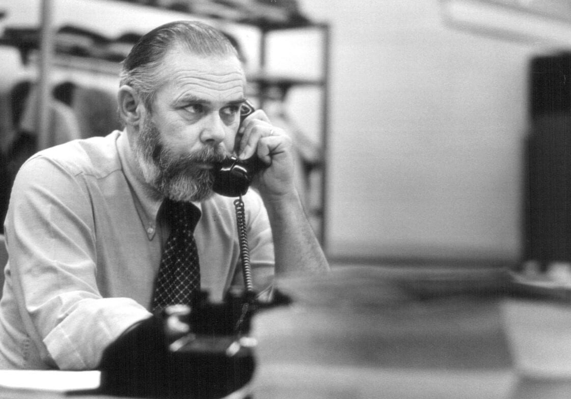 A journalist on a phone