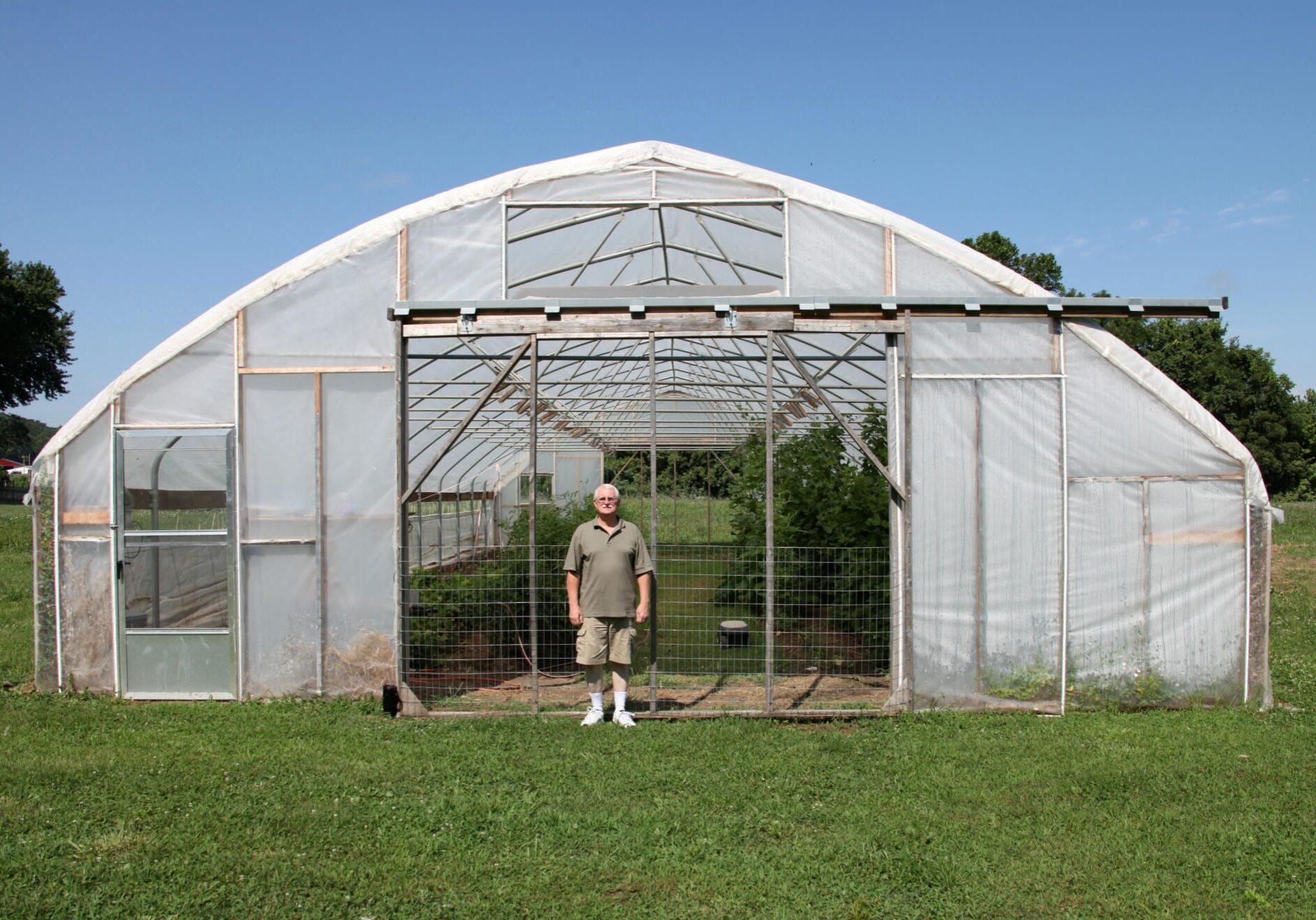Central Missouri farmer Gary Wenig plans to plant trap crops around his high tunnel in an effort to stop pests from eating his produce. (Photo: Kristofor Husted | Harvest Public Media)