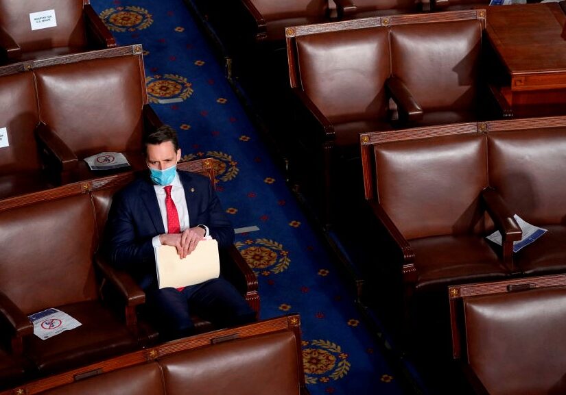 U.S. Sen. Josh Hawley (R-MO) sits alone in the House Chamber before a joint session of Congress on Jan. 06, 2021 in Washington, D.C.