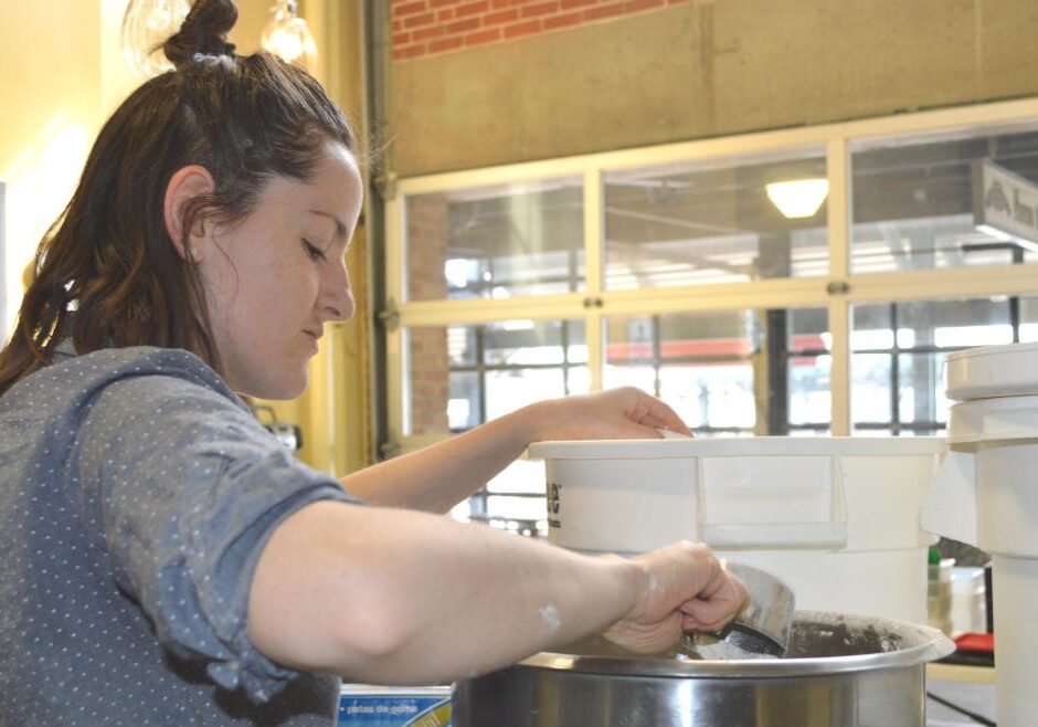 Kate (picture) and Scott Meinke haul ingredients by the bucketful to the Farm to Table Kitchen in City Market.  Photo: Jonathan Bender 