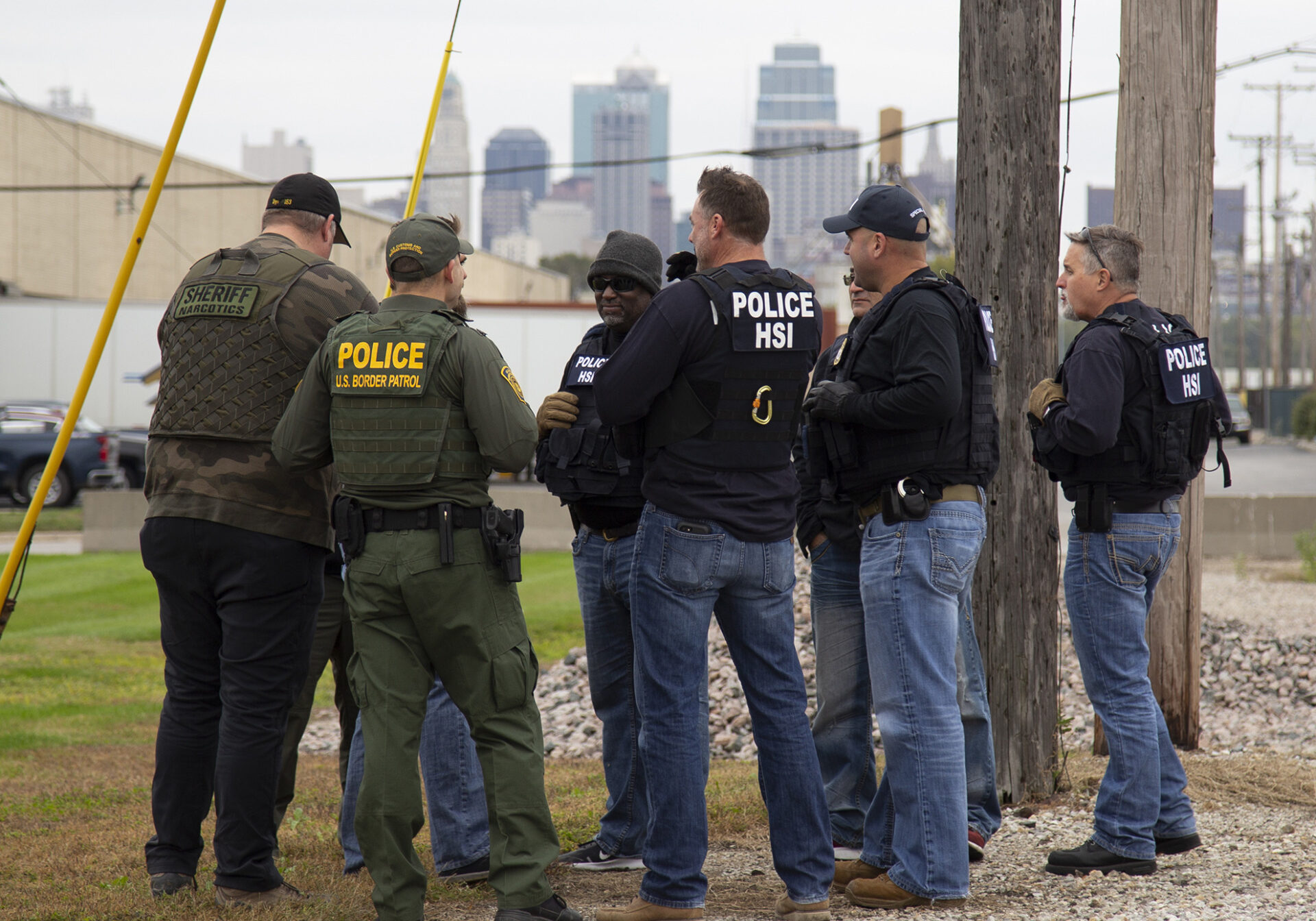Members of the U.S. Immigration and Customs Enforcement Border Enforcement Security Task Force in Kansas City confer. (Ron Rogers | U.S. Immigration and Customs Enforcement)