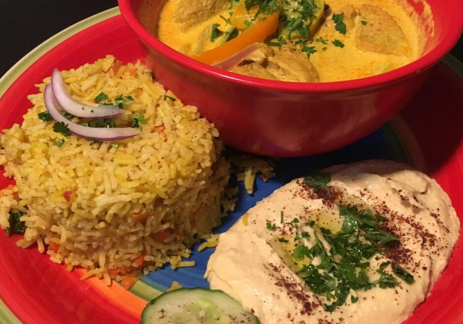 The chicken curry, rice and hummus at Kinzi Mediterranean Restaurant.