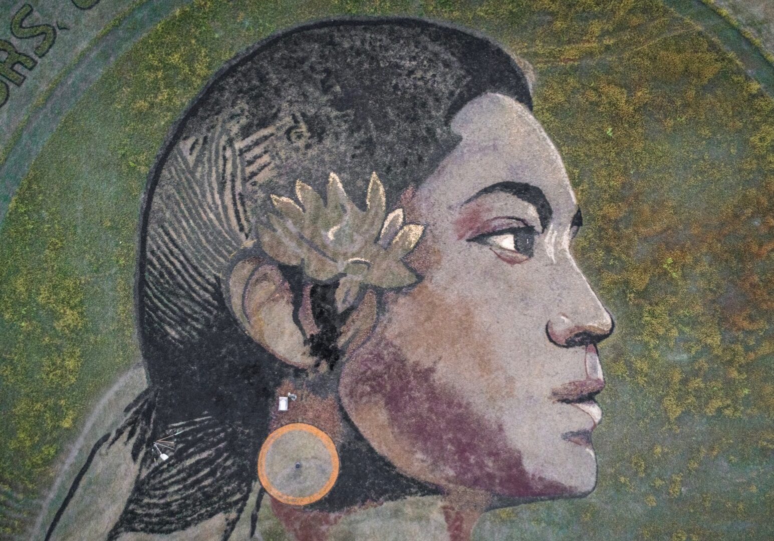 Lawrence, Kansas-based crop artist, Stan Herd, says his portrait of a Mexican indigenous woman is the most relevant work he has created. The portrait in a field in Linwood, Kansas. (Mary Sanchez | Flatland)