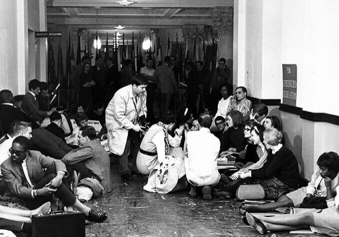 A group of students at the University of Kansas demonstrate for civil rights in 1965. Image courtesy of Dole Archives at the University of Kansas.