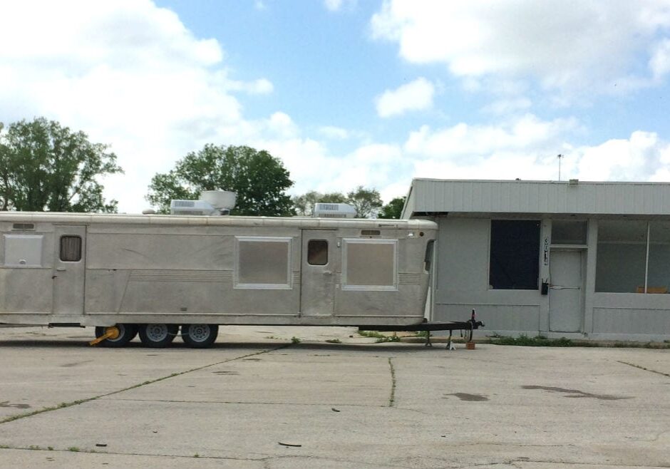 A food truck parked in a parking lot.