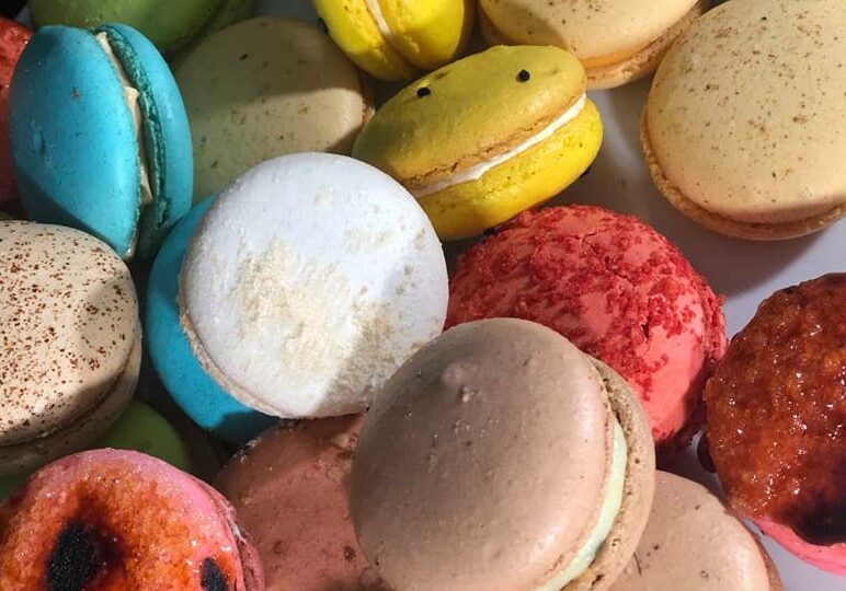 whole kaleidoscope of Covet Bakery's macarons