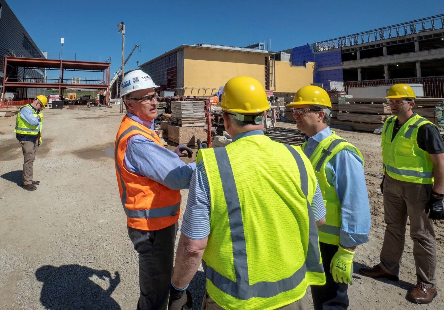 U.S. Department of Agriculture Secretary Sonny Perdue, joined by Sen. Pat Roberts (R-KS) and Sen. Jerry Moran (R-KS), is briefed by National Bio and Agri-Defense Facility Site Project Manger Tim Barr about the status of the facility being built on the Kansas State University campus in Manhattan, Kansas, on May 30, 2018.