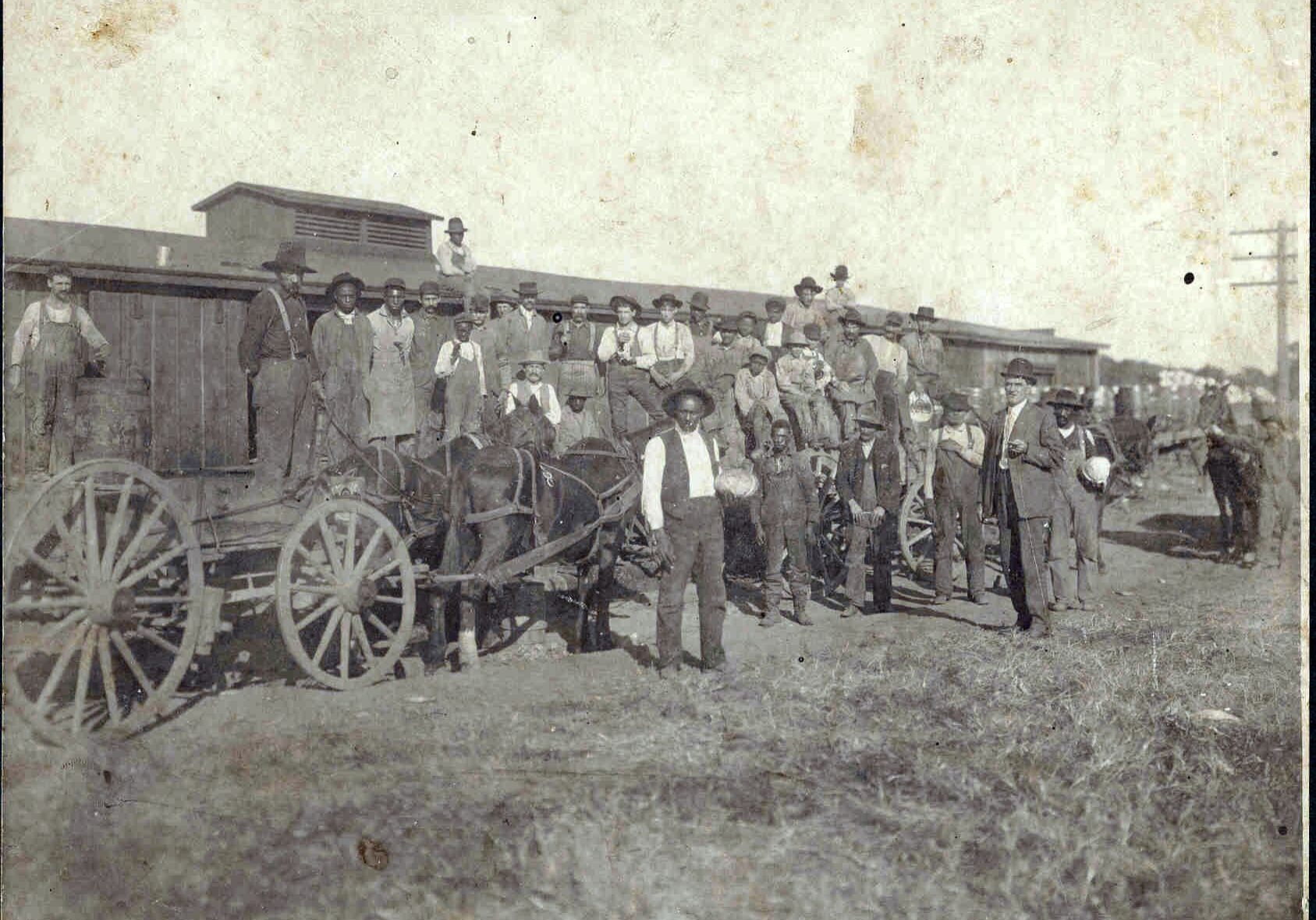 Junius Groves (center) grew more than just potatoes; he and his wife Matilda raised other vegetables and also tended orchards that produced apples, peaches and pears. (Photo courtesy, the Wyandotte County Historical Museum.)
