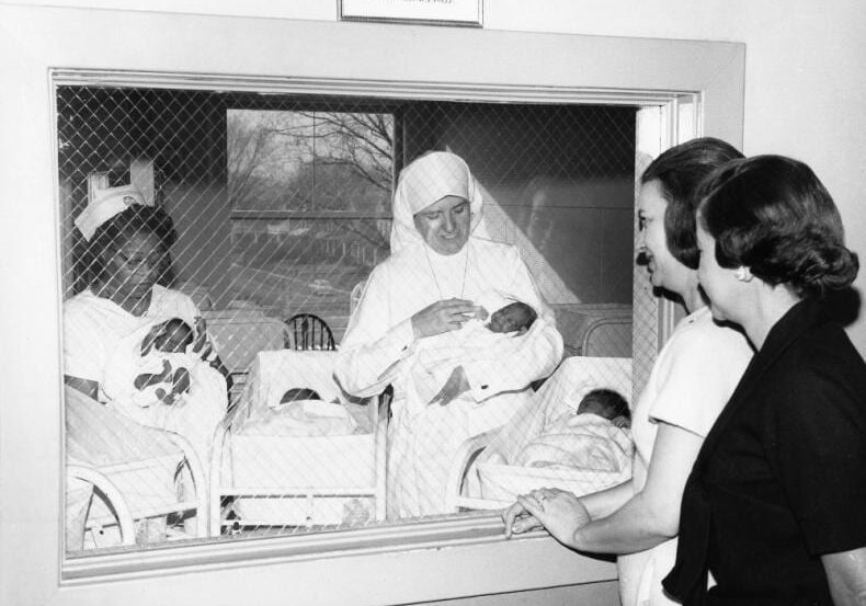 Sister Madeline Dorsey, the hospital’s administrator, works alongside a nurse at Queen of the World Hospital, circa 1960. (Contributed | Black Archives of Mid-America Kansas City)