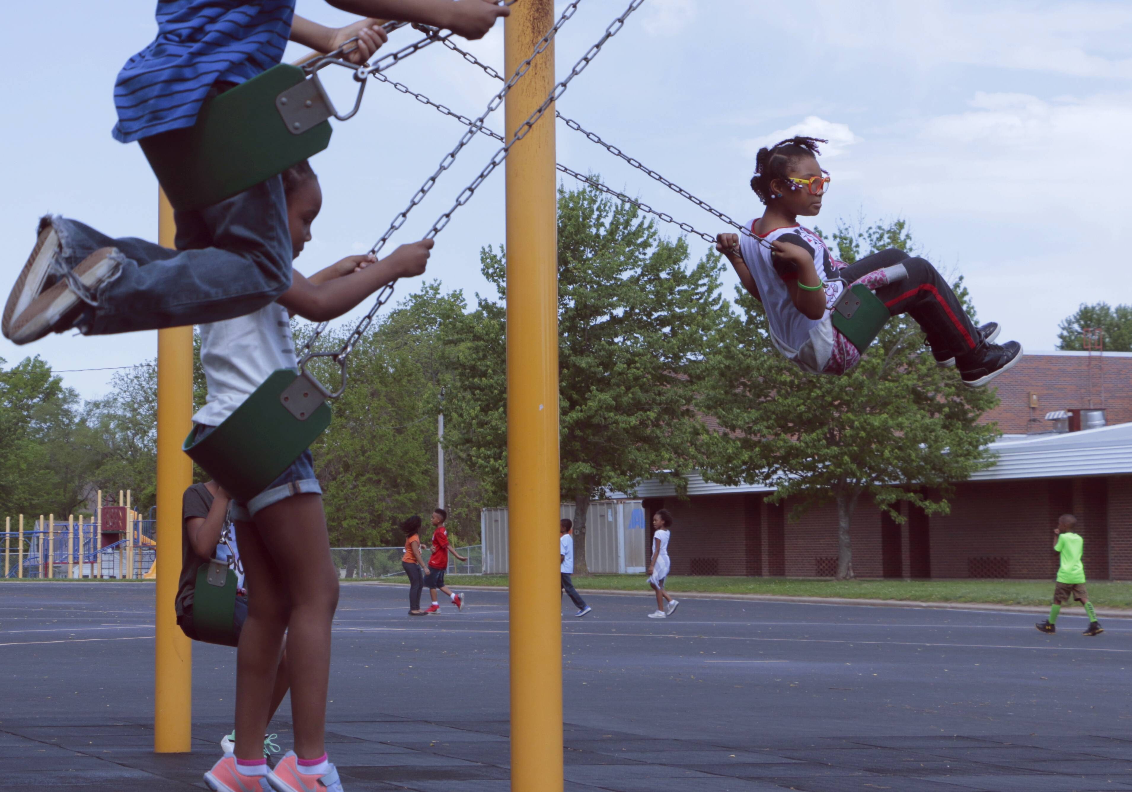 These kindergartners enjoy recess on a lovely morning recently at Fleetridge Elementary School in the Raytown School District, where the current superintendent and a former teacher (who is now a Missouri lawmaker) hold sharply different views on charter schools. (Mike Sherry | Flatland) 