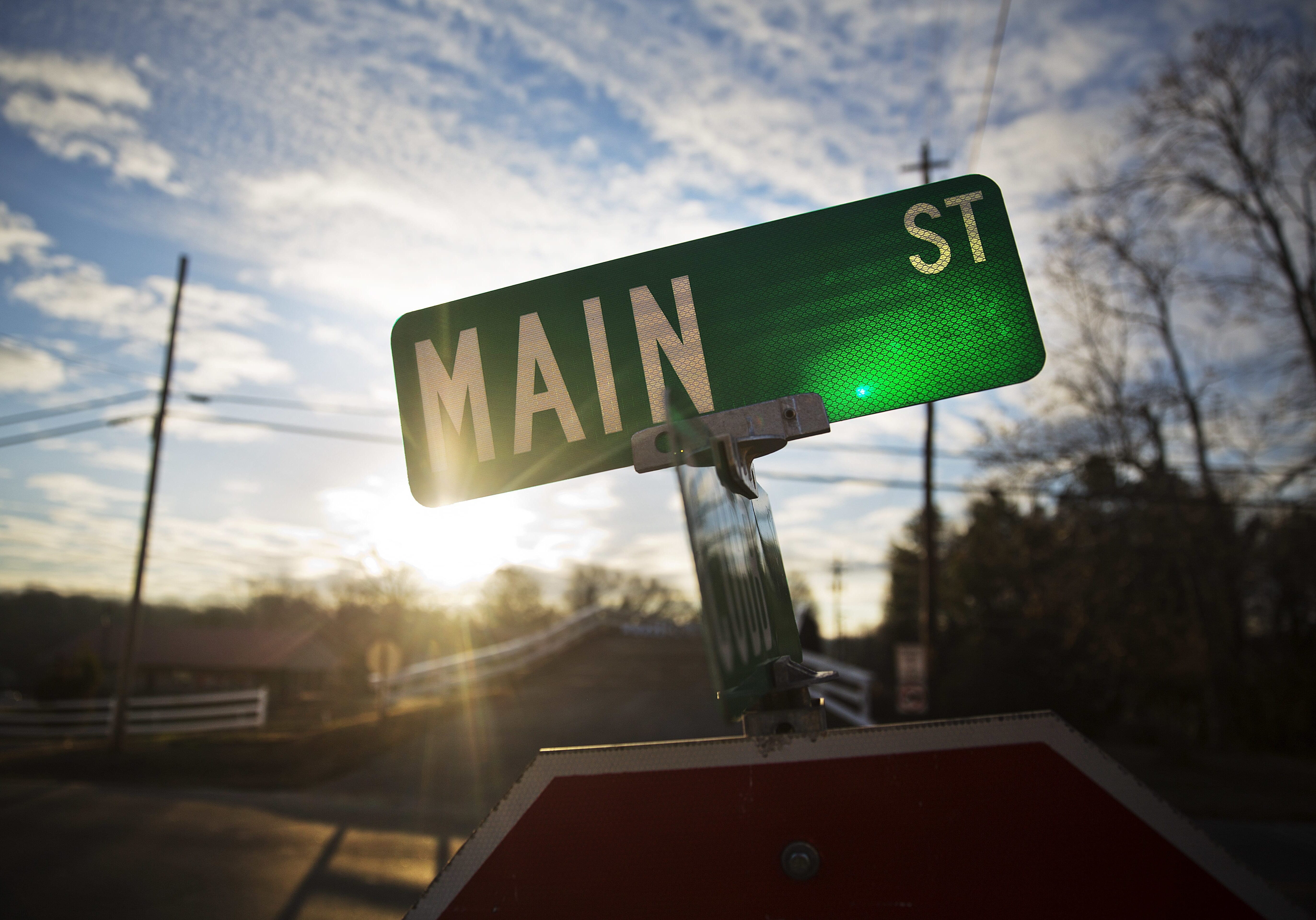 The sun rises over Main Street in Lula, Ga., in Hall County, Thursday, Jan. 12, 2017. As Donald John Trump prepares to enter the Oval Office, citizens with disparate views from urban and rural areas illuminate widening cultural fissures that help explain Trump's rise and will define his presidency. (AP Photo/David Goldman)