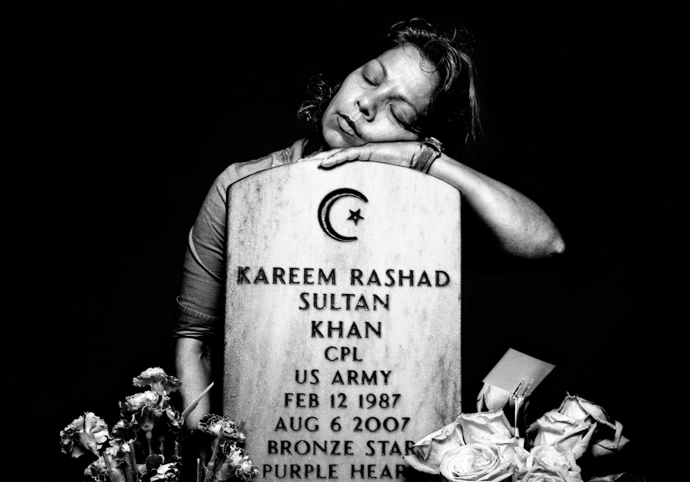 A woman at the grave of her soldier son