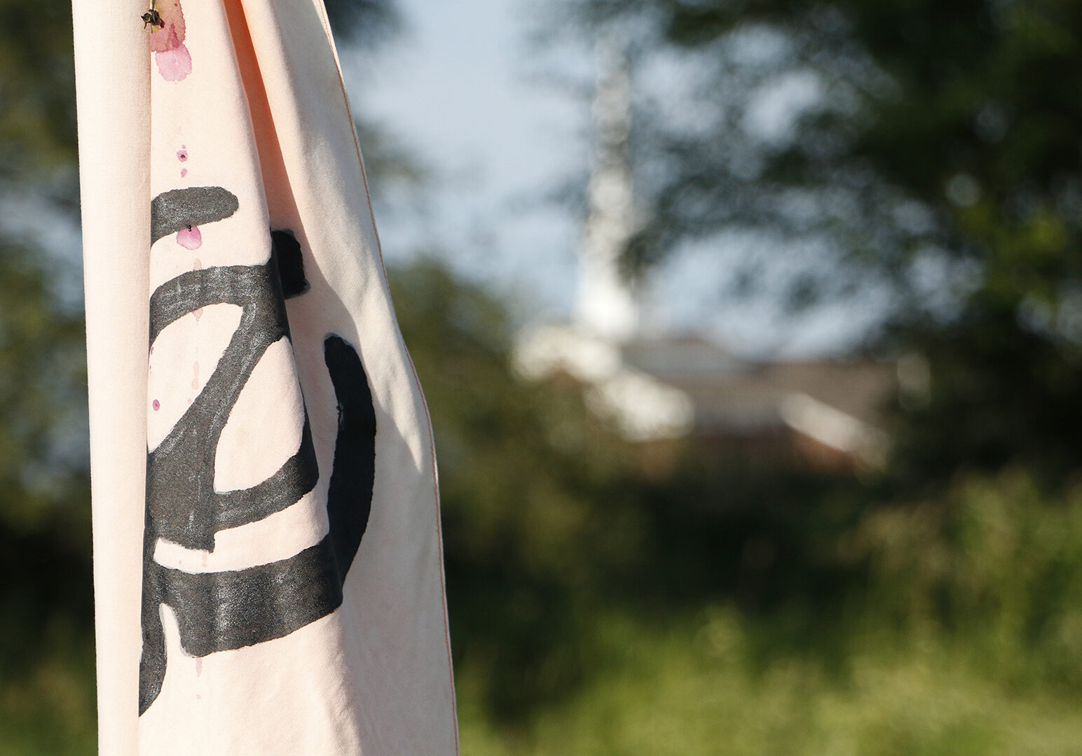 a sikh flag at the new temple site