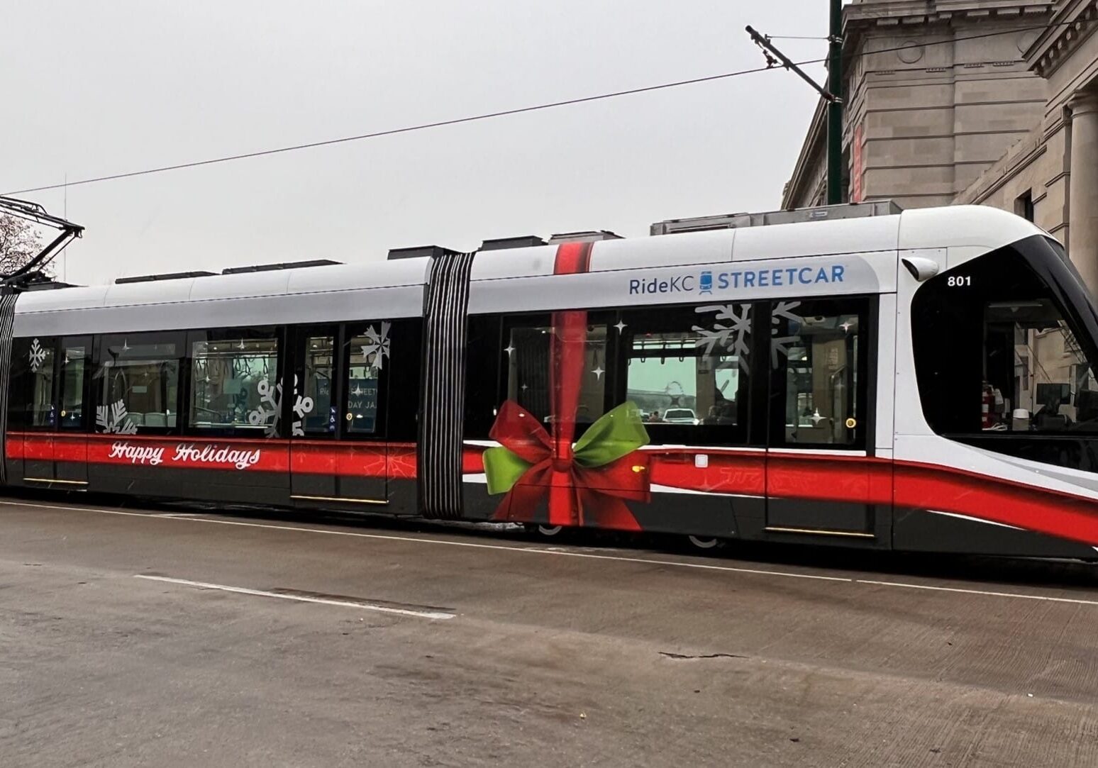 The KC Streetcar with a holiday wrap on it.