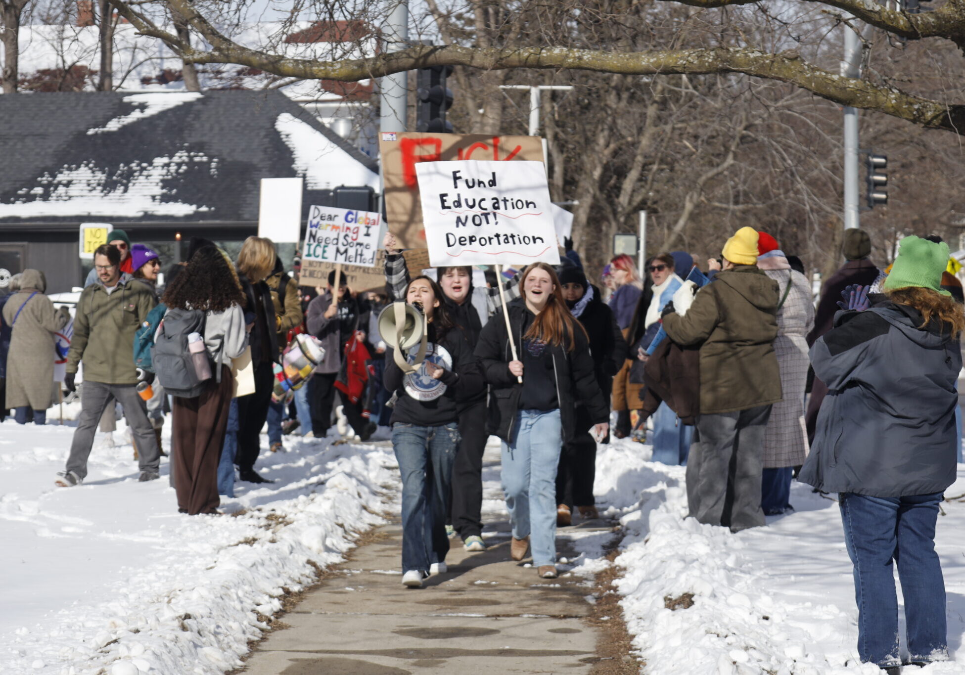 Lawrence High School students and residents protest Immigration and Customs Enforcement on Jan. 27, 2026, at 19th and Louisiana Street across from the high school. (Photo by Maya Smith for Kansas Reflector)