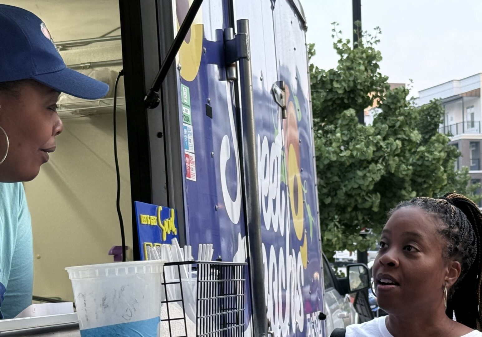 Denisha Jones thrives on customer interaction. She and her family run a food truck to help promote brand of recognition for Sweet Peaches and test new products. (Jill Wendholt Silva | Flatland)
