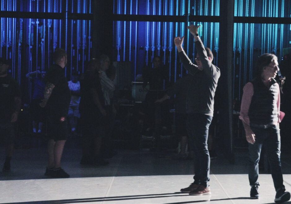 a man behind a stage