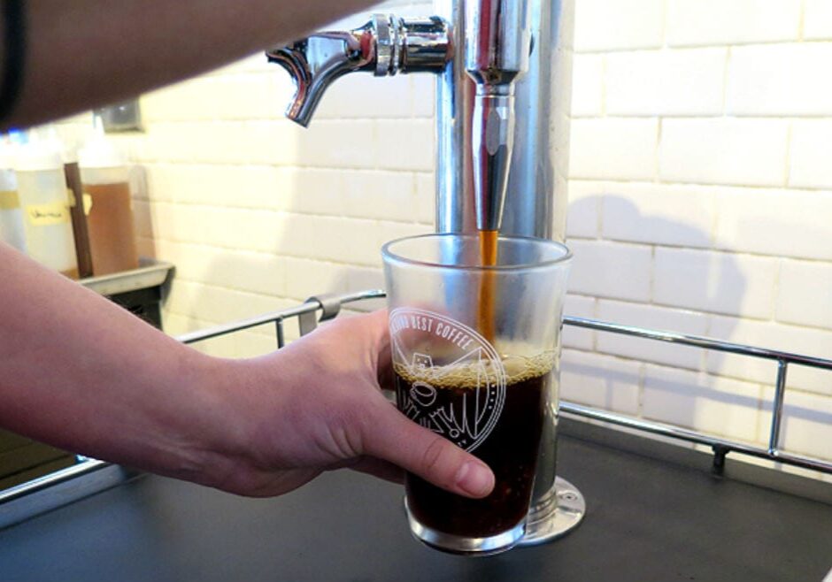 Coffee Being Poured From a Tap